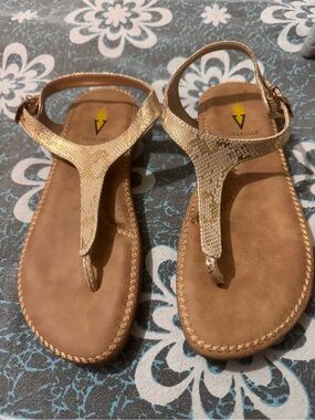Volatile Metallic Gold T-strap Sandals